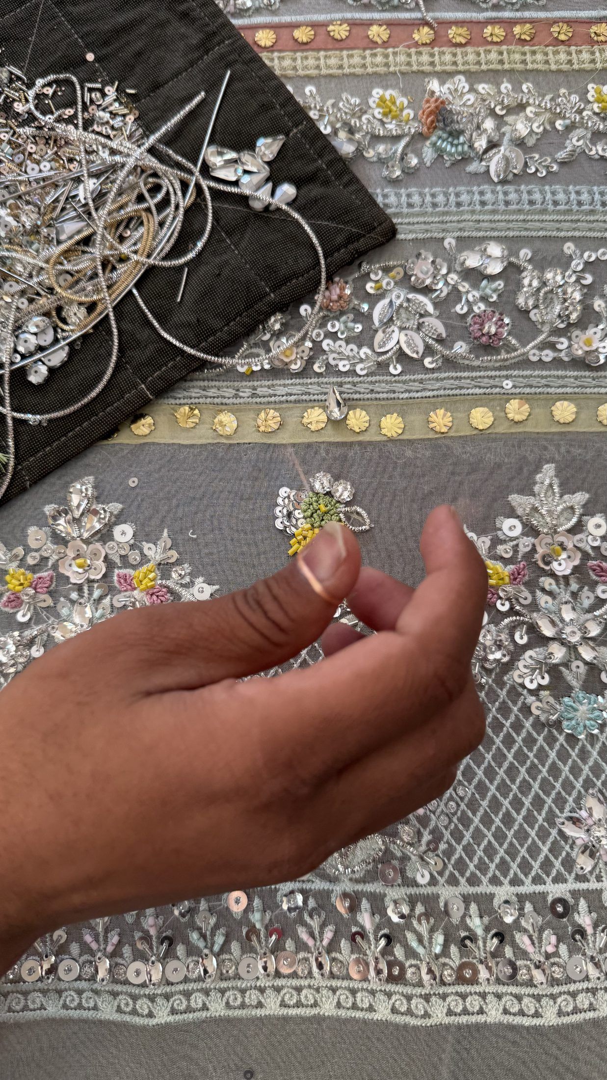 Macro detail of Lolo hand embellishment